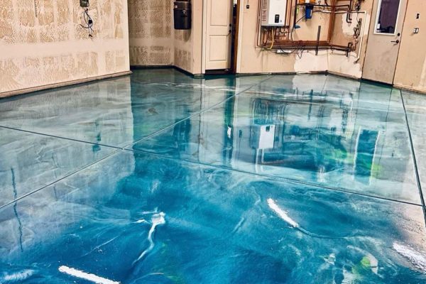 Interior view of a blue polished concrete floor, representing epoxy tile flooring services available in Las Vegas, NV.