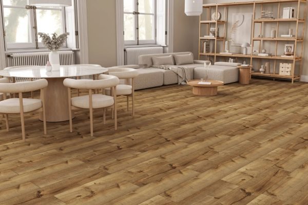A bright living room with wooden floors and white furniture, exemplifying modern design and comfort.